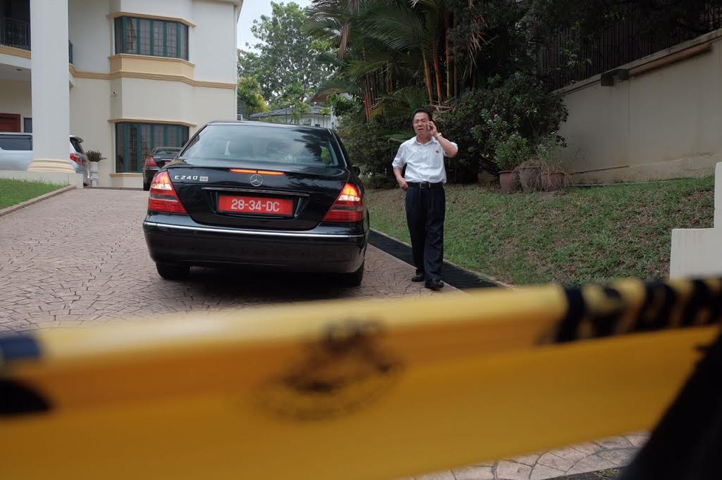 Seorang kakitangan Kedutaan Korea Utara berada di luar premis di Jalan Batai, Bukit Damansara.