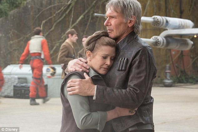 Carrie Fisher bersama Harrison Ford dalam salah satu sikuel Star Wars.