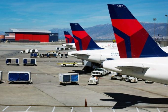 Delta planes line up at their gates while on the tarmac of Salt Lake City International Airport in Utah