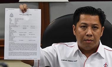 Ahli seumur hidup DAP, Amran Ahmad pada sidang media di Kuala Lumpur hari ini.