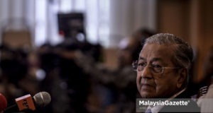 Reaksi Dr Mahathir Mohamad pada sidang media di Yayasan Kepimpinan Perdana, Presint 8, Putrajaya. foto AFIQ RAZALI, 16 MEI 2018.