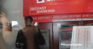 ATM RM1 cash withdrawal charge fee MEPS bank