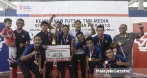 Pasukan futsal Tenaga Nasional Berhad (TNB) muncul selaku juara pada Kejohanan Futsal TNB-MEDIA Sempena Piala Dunia Fifa 2018 di Padang Futsal TNB, Bangsar, Kuala Lumpur. foto AFIQ RAZALI, 07 JULAI 2018.
