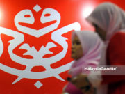 Sekolah Politik UMNO dibuka tahun depan Dua perwakilan Pergerakan Puteri UMNO dilihat melintasi dinding yang dihiasi logo parti UMNO ketika tinjauan lensa Malaysia Gazette sempena Perhimpunan Agung UMNO 2017 di Pusat Dagangan Dunia Putra (PWTC), Kuala Lumpur. foto SAFWAN MANSOR, 07 DISEMBER 2017