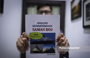 Buku Analisis Kewartawanan Saman DOJ.