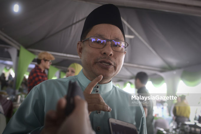 Pengerusi KTMB, Datuk Nawawi Ahmad bercakap kepada media selepas Majlis Rumah Terbuka Hari Raya KTMB di Ibu Pejabat KTMB, Kuala Lumpur. foto AFIQ RAZALI, 10 JULAI 2018.