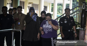 Seorang pengasuh dituduh di Mahkamah Sesyen Selayang hari ini atas dakwaan menganiaya bayi berusia 5 bulan sehingga menyebabkan kematian pada 3 Julai lalu. - foto: AFFAN FAUZI, 13 JULAI 2018.