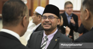 Menteri Di Jabatan Perdana Menteri, Datuk Mujahid Yusof Rawa ketika menghadiri sesi perbahasan di Dewan Rakyat, Bangunan Parlimen, Kuala Lumpur. foto FAREEZ FADZIL, 25 JULAI 2018