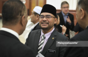 Menteri Di Jabatan Perdana Menteri, Datuk Mujahid Yusof Rawa ketika menghadiri sesi perbahasan di Dewan Rakyat, Bangunan Parlimen, Kuala Lumpur. foto FAREEZ FADZIL, 25 JULAI 2018