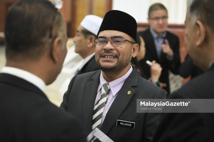 Menteri Di Jabatan Perdana Menteri, Datuk Mujahid Yusof Rawa ketika menghadiri sesi perbahasan di Dewan Rakyat, Bangunan Parlimen, Kuala Lumpur. foto FAREEZ FADZIL, 25 JULAI 2018