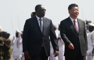 Presiden China Xi Jinping bersama Presiden Senegal, Macky Sall.
