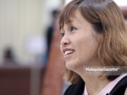 Guru, pelajar balik dari China perlu jalani kuarantin 14 hari di rumah Timbalan Menteri Pendidikan, Teo Nie Ching ketika menghadiri sesi perbahasan di Dewan Rakyat, Bangunan Parlimen, Kuala Lumpur. foto FAREEZ FADZIL, 06 OGOS 2018