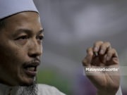 Nik Abduh pertahan menteri Pas tak pakai pelitup muka Nik Mohamad Abduh Nik Abdul Aziz