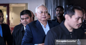 Bekas Perdana Menteri, Datuk Seri Najib Tun Razak tiba di Jabatan Siasatan Jenayah Komersial, Menara KPJ, Jalan Tun Razak untuk rakaman percakapan oleh pihak polis mengikut Akta Pencegahan Pengubahan Wang Haram, Pencegahan Pembiayaan Keganasan dan Hasil Daripada Aktiviti Haram (AMLATFPUAA) 2001 di Kuala Lumpur. foto HAZROL ZAINAL, 20 SEPTEMBER 2018.