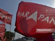 Malaysia: Membina harapan atas kehancuran