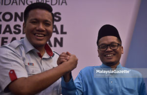 Ketua Angkatan Muda Keadilan (AMK), Nik Nazmi Nik Ahmad bersama Calon Ketua AMK, Afif Bahardin (kanan) ketika Kongres Nasional Keadilan ke-13 di Ideal Convention Centre (IDCC), Shah Alam, Selangor. foto FAREEZ FADZIL, 16 NOVEMBER 2018.
