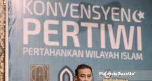 Presiden Ikatan Muslimin Malaysia (ISMA), Aminuddin Yahaya berucap pada Konvensyen Pertahan Wilayah Islam (PERTIWI) anjuran Ikatan Muslimin Malaysia (ISMA) di Pusat Dagangan Dunia Putra (PWTC), Kuala Lumpur. foto AFIQ RAZALI, 24 NOVEMBER 2018.