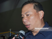 Dua lelaki ugut, kasari wartawan MalaysiaGazette ditahan Ahmad Dzaffir Mohd.Yussof.