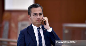 Member of Parliament (MP) of Lembah Pantai, Fahmi Fadzil at the Parliament for the Dewan Rakyat sitting. PIX: FAREEZ FADZIL / MalaysiaGazette / 21 NOVEMBER 2019 MySejahtera check out