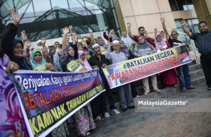 Peserta Felcra Teratak Batu bantah tender terbuka penjualan kayu getah