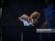 Tiada pemansuhan butiran agama pada kad pengenalan – KDN