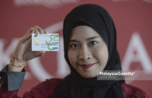 Mujahid Yusof Melancarkan Kad Debit-i Bank Islam Visa Tabung Haji