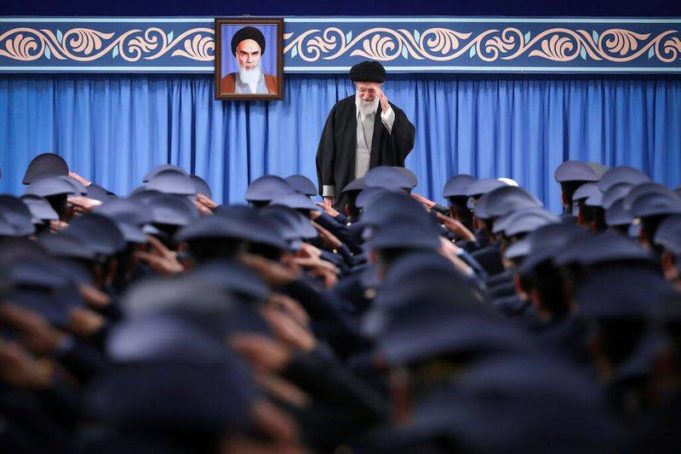 Iran's Supreme Leader Ayatollah Ali Khamenei gestures as he meets a group of Iranian Air Force officers in Tehran