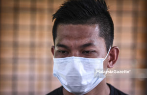 Anggota bomba kematian bapa pendam rasa sedih kerana tugas tangani Covid-19