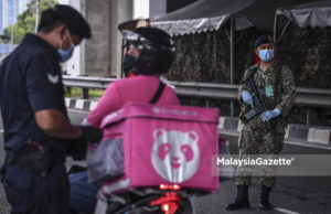 Puasa tak lemahkan semangat polis buat sekatan jalan