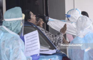 Petugas KKM Lakukan Saringan Covid19 Rumah ke Rumah