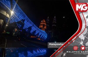 TERKINI : Bangunan Ibu Kota KL Pancar Lampu Biru Hargai ‘Barisan Hadapan’
