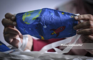 Laporan pelitup muka jenis fabrik punca dijangkiti tidak tepat – KKM