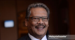 Tan Sri Mohamed Apandi Ali Attorney-General termination Mahathir Mohamad government suit