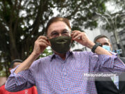 Wajah Anwar Ibrahim di Bukit Aman