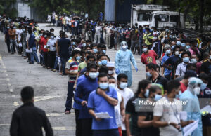 Pekerja asing wajib buat ujian saringan Covid-19 mulai tahun depan