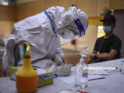 5,522 Covid-19 cases today Covid-19 cases infections volunteers Healthcare worker from Sel Care jotting down information prior to conducting Covid-19 screening. PIX: HAZROL ZAINAL / MalaysiaGazette / 07 FEBRUARY 2021. Covid-19 vaccine clinical trial