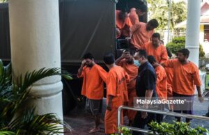 Eight suspects including the father who raped and forced his daughter and wife into prostitution are brought to the Bandar Baru Bangi Magistrate Court in Selangor for the application of a new remand order under ATIPSOM. PIX: MOHD ADZLAN / MalaysiaGazette / 25 JULY 2020. sexual drive sexual exploitation