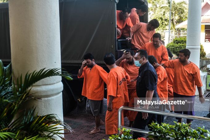 Eight suspects including the father who raped and forced his daughter and wife into prostitution are brought to the Bandar Baru Bangi Magistrate Court in Selangor for the application of a new remand order under ATIPSOM. PIX: MOHD ADZLAN / MalaysiaGazette / 25 JULY 2020. sexual drive sexual exploitation