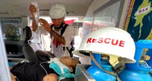 The wounded man is treated in an ambulance in Yangon's Hledan township. PIX: BBC BURMESE