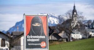 Switzerland has narrowly voted in favour of banning face coverings in public, including the burka or niqab worn by Muslim women. Posters promoted by the Swiss People's Party featured a woman in a black niqab and captions such as "Stop extremism!" and "Stop radical Islam!" PIX: EPA via BBC