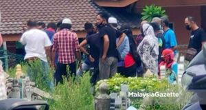 Chow Kit amok The remains of Private Adam was laid to rest at the Dato Keramat Muslim Cemetery yesterday.