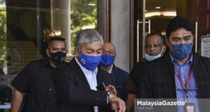 criminal charges Former Deputy Prime Minister Datuk Seri Dr Ahmad Zahid Hamidi walks out of the Kuala Lumpur Courts Complex after his corruption, power abuse and money laundering trial involving Yayasan Akalbudi. PIX: FIKRI YAZID / MalaysiaGazette / 9 MARCH 2021