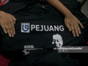 (Picture for representational purposes only). The t-shirt of Parti Pejuang Tanah Air (PEJUANG) with the picture of its Chairman, Tun Dr Mahathir Mohamad. PIX: MalaysiaGazette opposition DAP Teo Nie Ching Prime Minister