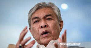 The President of UMNO, Datuk Seri Ahmad Zahid Hamidi frog party-hopping