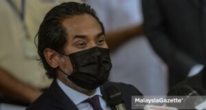 Khairy Jamaluddin Abu Bakar Covid-19 vaccine National Covid-19 Immunisation Prorgamme registration Undi 18 delay EC Election Commission work performance online poll survey