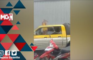 Bulatan Jalan Pahang roundabout 4WD motorcycle commotion machete helmet