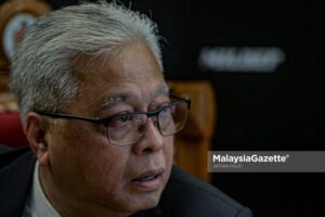 Datuk Seri Ismail Sabri Yaakob MCO burger seller stall RM50,000 compound Wan Mohd Faisal Wan Kadir