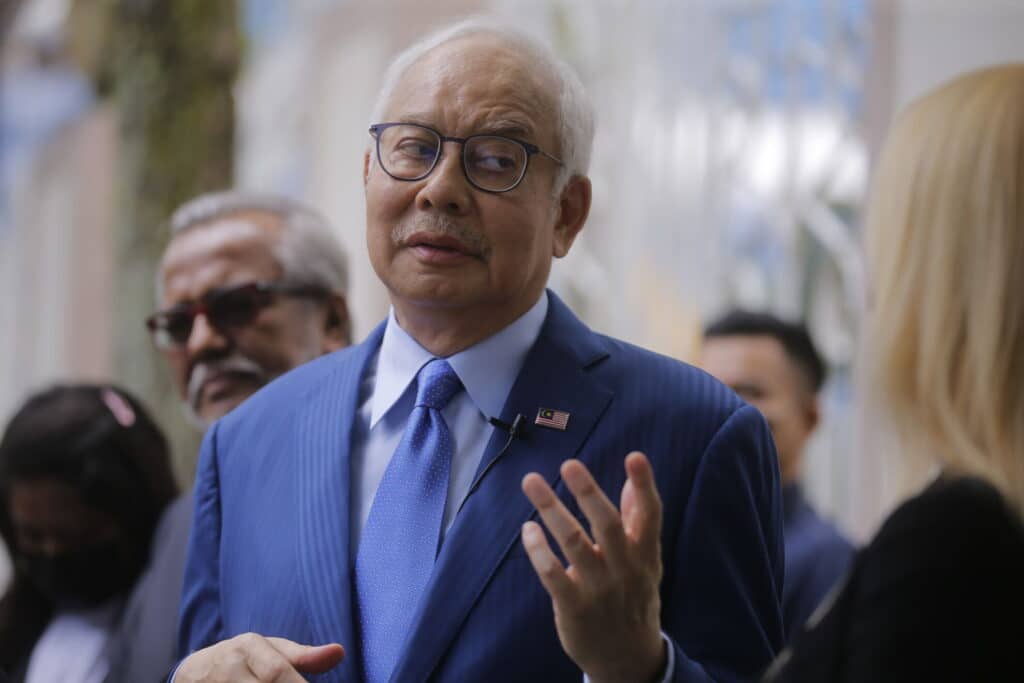 Former Prime MInister Datuk Seri Najib Razak 1MDB forfeiture suit RM114 million Pavilion Residences Covid-19 vaccination vaccine wolverine mutant microchip