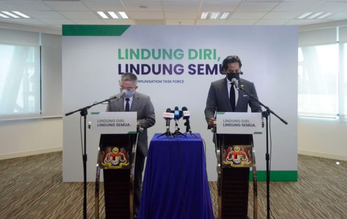 Minister of Science, Technology and Innovation cum Coordinating Minister Khairy Jamaluddin Abu Bakar of the National Covid-19 Immunisation Programme (PICK) and Health Minister Datuk Seri Dr Adham Baba in a joint-news conference on the latest update of PICK. PIX: Courtesy of MOSTI