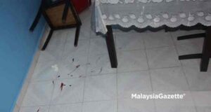 depression The blood stains on the floor of a house after a 17-year-old boy with depression attacked his 60 year-old father with a knife. at Taman Alma Jaya, Bukit Mertajam, Penang,